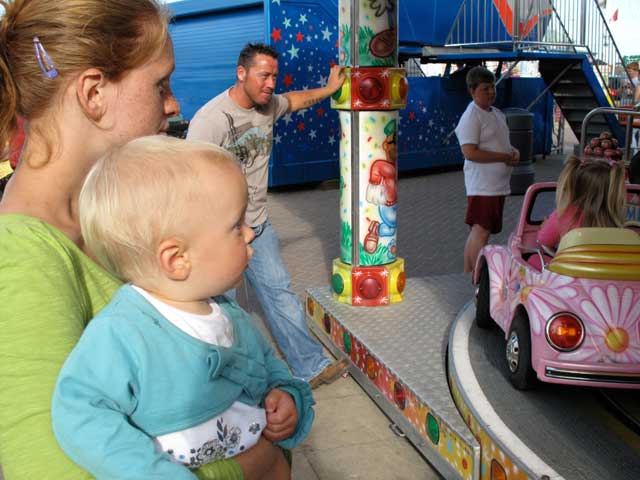 young Mother at amusement arcade